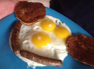 Eggs, Pancakes, and Sausage face -- designed by my creative son